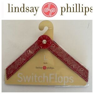 NWT Lindsay Phillips switch flops. Size large “faith”